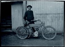 Father Valentin Franckx, SS.CC., and his Harley Davidson motorcycle.
